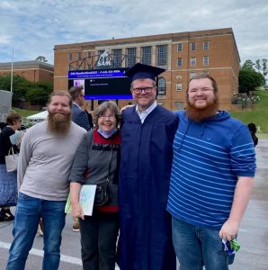 Jack Elliott and his family after earning his degree.